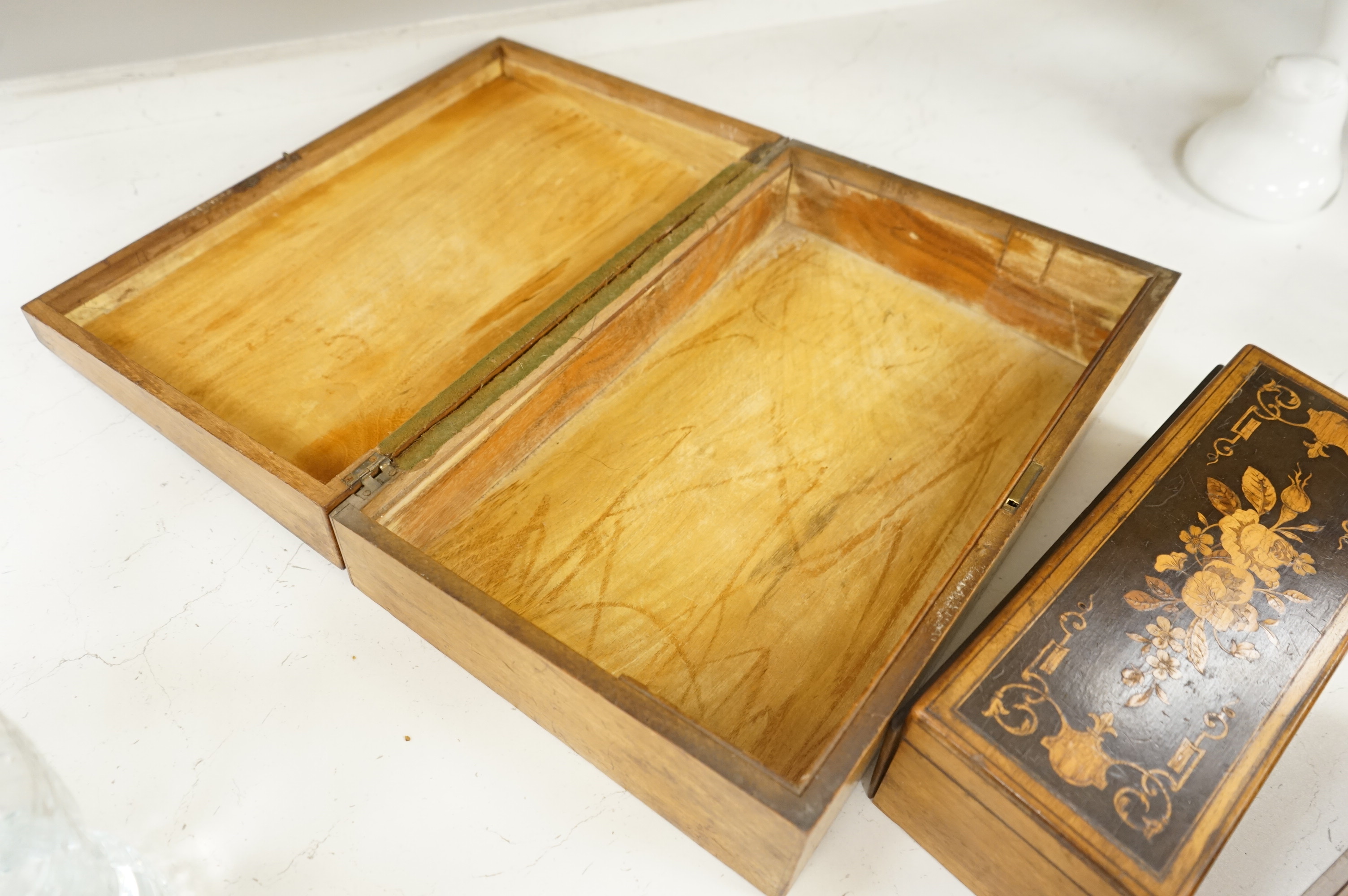 Three boxes comprising a Sorrento ware glove box, a marquetry inlaid slope and a rosewood dressing box, largest 39cm wide